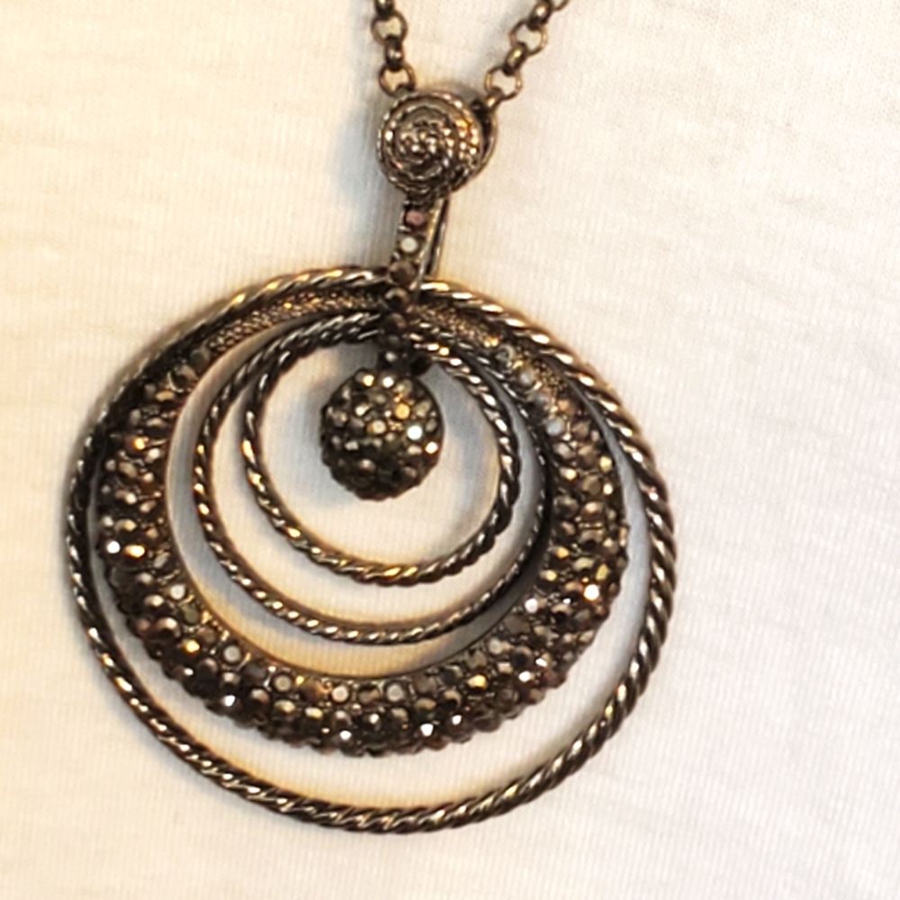 Bold gunmetal circles necklace with faux marcasite